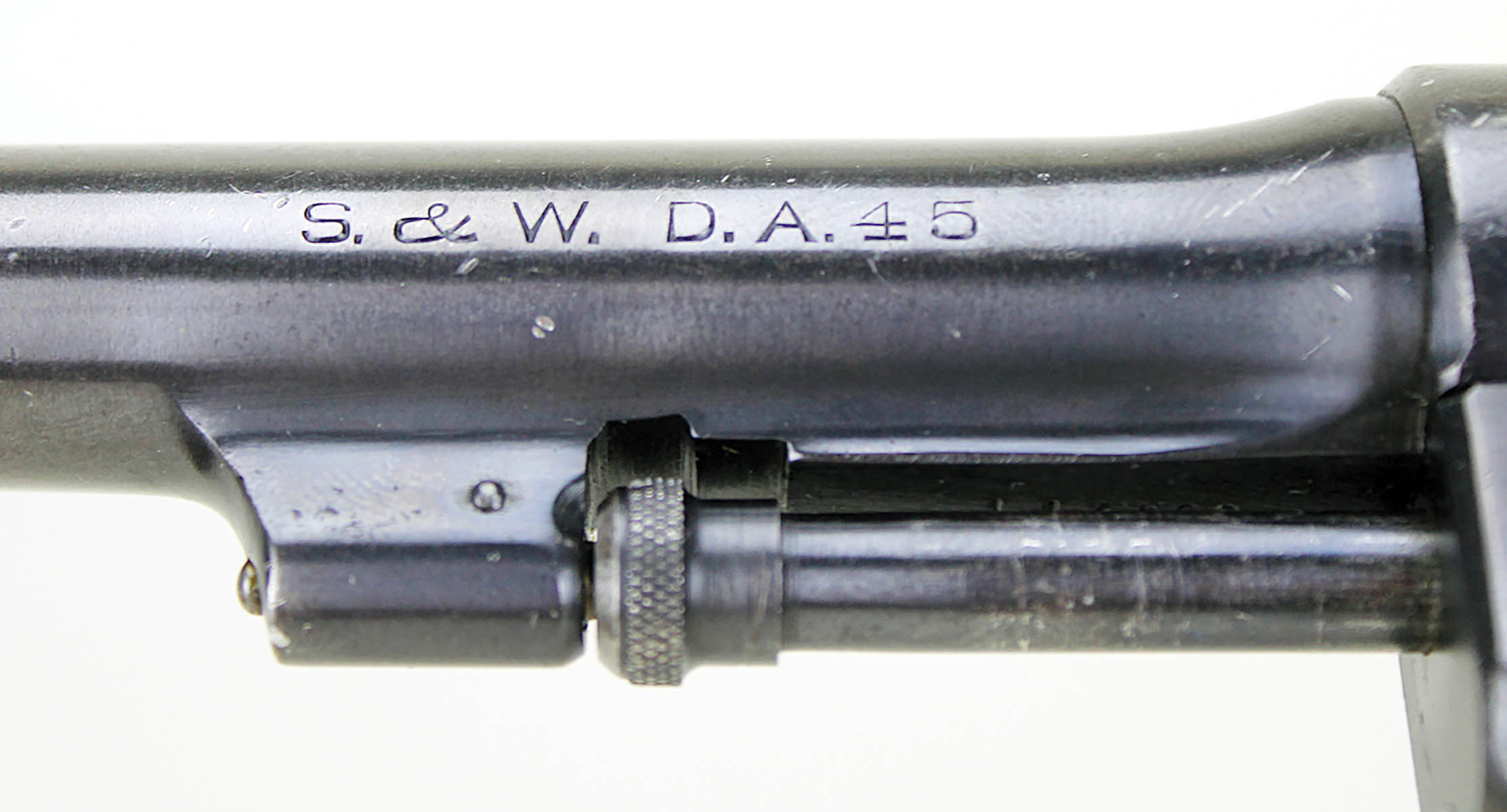 …and the maker, “D.A.” for Double Action and caliber on the barrel’s left side.